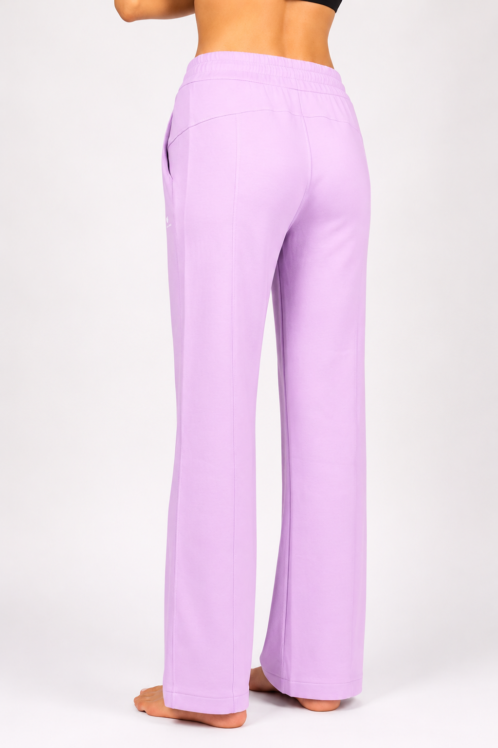 Lavender wide-leg pants worn by a person on a white background